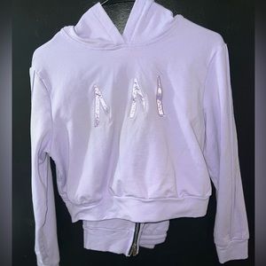 Lavender cropped hoodie with matching bottoms.
